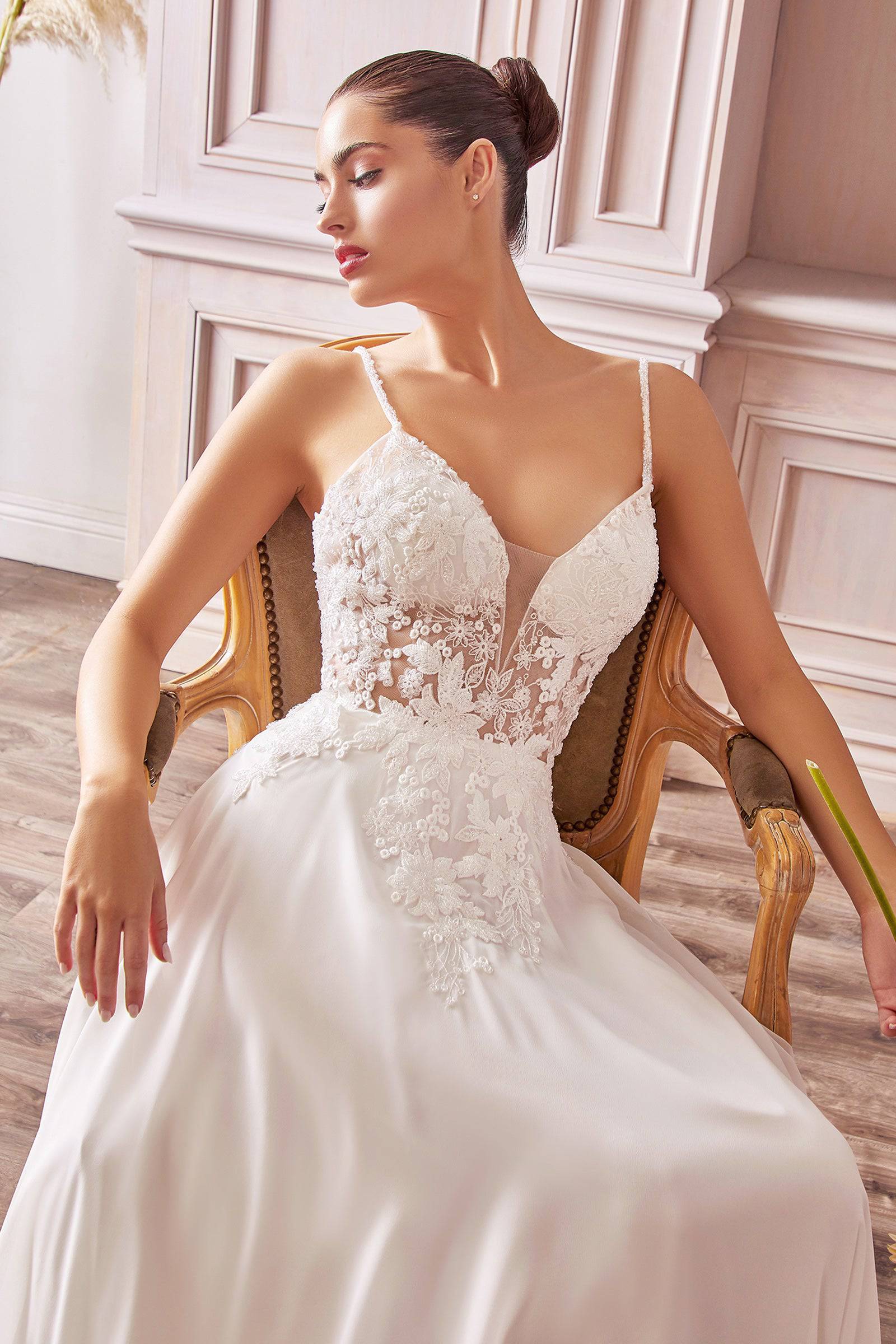 Elegant Wedding Gown with Sheer Bodice and Long Flowy Skirt